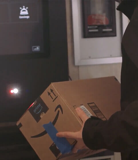 Man scanning package for delivery